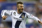 MONTREAL, CANADA - MAY 12:  David Beckham #23 of the Los Angeles Galaxy celebrates his game tying penalty kick during the MLS match against the Montreal Impact at the Olympic Stadium on May 12, 2012 in Montreal, Quebec, Canada.  The game ended in a 1-1 tie.  (Photo by Richard Wolowicz/Getty Images)
