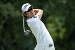 PONTE VEDRA BEACH, FL - MAY 12: Kevin Na of the United States hits his tee shot on the seventh hole during the third round of THE PLAYERS Championship held at THE PLAYERS Stadium course at TPC Sawgrass on May 12, 2012 in Ponte Vedra Beach, Florida.  (Photo by Andy Lyons/Getty Images)