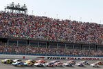 TALLADEGA, AL - MAY 06:  Brad Keselowski, driver of the #2 Miller Lite Dodge, and Matt Kenseth, driver of the #17 Best Buy Ford, lead the field to a restart during the NASCAR Sprint Cup Series Aaron's 499 at Talladega Superspeedway on May 6, 2012 in Talladega, Alabama.  (Photo by Tyler Barrick/Getty Images)
