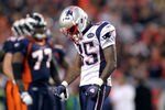 DENVER, CO - DECEMBER 18: Chad Ochocinco #85 of the New England Patriots walks off the field with his head down against the Denver Broncos on December 18, 2011 during the first half at Sports Authority Field at Mile High in Denver, Colorado. The New England Patriots won the game 41-23. (Photo by Marc Piscotty/Getty Images)