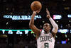 BOSTON, MA - MAY 12:  Rajon Rondo #9 of the Boston Celtics takes a shot in the first quarter against the Philadelphia 76ers in Game One of the Western Conference Semifinals in the 2012 NBA Playoffs on May 12, 2012 at TD Garden in Boston, Massachusetts. NOTE TO USER: User expressly acknowledges and agrees that, by downloading and or using this photograph, User is consenting to the terms and conditions of the Getty Images License Agreement.  (Photo by Elsa/Getty Images)