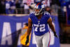 EAST RUTHERFORD, NJ - JANUARY 01:  Osi Umenyiora #72 of the New York Giants reacts after a tackle against the Dallas Cowboys at MetLife Stadium on January 1, 2012 in East Rutherford, New Jersey.  (Photo by Jeff Zelevansky/Getty Images)