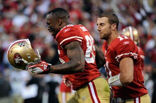 SAN FRANCISCO, CA - JANUARY 14:  Vernon Davis #85 of the San Francisco 49ers reacts with Alex Smith #11 after his touchdown in the fourth quarter of the NFC Divisional playoff game against the New Orleans Saints at Candlestick Park on January 14, 2012 in San Francisco, California.  (Photo by Thearon W. Henderson/Getty Images)