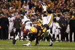PITTSBURGH, PA - NOVEMBER 06:  Anquan Boldin #81 of the Baltimore Ravens is tackled by Ike Taylor #24 of the Pittsburgh Steelers after catching a pass during the game on November 6, 2011 at Heinz Field in Pittsburgh, Pennsylvania.  (Photo by Jared Wickerham/Getty Images)