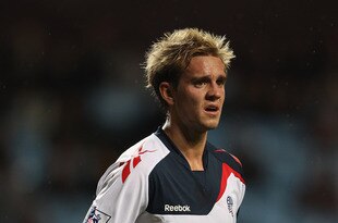 BIRMINGHAM, ENGLAND - SEPTEMBER 20:  Stuart Holden of Bolton Wanderers during the Carling Cup third round match between Aston Villa and Bolton Wanderers at Villa Park on September 20, 2011 in Birmingham, England.  (Photo by Michael Steele/Getty Images)