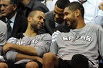 SALT LAKE CITY, UT  - MAY 7: Tim Duncan #21 of the San Antonio Spurs shares a laugh on the bench with teammate Tony Parker #9 of the San Antonio Spurs during the fourth quarter of Game Four of the Western Conference Quarterfinals against the Utah Jazz in the 2012 NBA Playoffs at EnergySolutions Arena on May 07, 2012 in Salt Lake City, Utah. The Spurs won the game 87-81 and swept the Jazz four games to zero. NOTE TO USER: User expressly acknowledges and agrees that, by downloading and or using this photograph, User is consenting to the terms and conditions of the Getty Images License Agreement. (Photo by Steve Dykes/Getty Images)