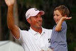 PONTE VEDRA BEACH, FL - MAY 13:  Matt Kuchar of the United States hugs his son Cameron after holing the winning putt on the par 4, 18th green during the final round of THE PLAYERS Championship held at THE PLAYERS Stadium course at TPC Sawgrass on May 13, 2012 in Ponte Vedra Beach, Florida.  (Photo by Mike Ehrmann/Getty Images)