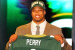 NEW YORK, NY - APRIL 26:  Nick Perry from USC holds up a jersey as he stands on stage after he was selected #28 overall by the Green Bay Packers in the first round of the 2012 NFL Draft at Radio City Music Hall on April 26, 2012 in New York City.  (Photo by Al Bello/Getty Images)