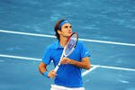 MADRID, SPAIN - MAY 12:  Roger Federer of Switzerland follows the ball in his semi final match against Janko Tipsarevic of Serbia during the Mutua Madrilena Madrid Open tennis tournament at the Caja Magica on May 12, 2012 in Madrid, Spain.  (Photo by Jasper Juinen/Getty Images)