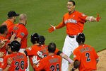 MIAMI, FL - MAY 13: Giancarlo Stanton #27 of the Miami Marlins celebrates at home plate after hitting a walk off grand slam during a game against the New York Mets at Marlins Park on May 13, 2012 in Miami, Florida. The Marlins defeated the Mets 8-4. (Photo by Sarah Glenn/Getty Images)