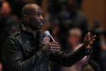 DALLAS, TX - FEBRUARY 04:  Chad Ochocinco of the Cincinnati Bengals asks NFL commissioner Roger Goodell a question during a press conference at the Super Bowl XLV media center on February 4, 2011 in Dallas, Texas. The Green Bay Packers will play the Pittsburgh Steelers in Super Bowl XLV on February 6, 2011 at Cowboys Stadium in Arlington, Texas.  (Photo by Doug Pensinger/Getty Images)