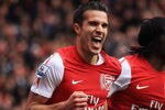 LONDON, ENGLAND - MAY 05:  Robin van Persie of Arsenal celebrates scoring their third goal during the Barclays Premier League match between Arsenal and Norwich City at the Emirates Stadium on May 5, 2012 in London, England.  (Photo by Bryn Lennon/Getty Images)