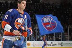 UNIONDALE, NY - MARCH 29: John Tavares #91 of the New York Islanders leaves the ice following the game against the Pittsburgh Penguins at the Nassau Veterans Memorial Coliseum on March 29, 2012 in Uniondale, New York. The Islanders defeated the Penguins 5-3.  (Photo by Bruce Bennett/Getty Images)