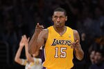 LOS ANGELES, CA - MAY 12:  Metta World Peace #15 of the Los Angeles Lakers reacts after making a shot against the Denver Nuggets in Game Seven of the Western Conference Quarterfinals in the 2012 NBA Playoffs on May 12, 2012 at Staples Center in Los Angeles, California. NOTE TO USER: User expressly acknowledges and agrees that, by downloading and or using this photograph, User is consenting to the terms and conditions of the Getty Images License Agreement.  (Photo by Harry How/Getty Images)
