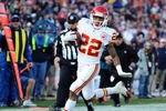DENVER, CO - JANUARY 1: Dexter McCluster #22 of the Kansas City Chiefs runs in for a touchdown against Quinton Carter #28 of the Denver Broncos during the game at Sports Authority Field at Mile High on January 1, 2012 in Denver, Colorado.  (Photo by Garrett W. Ellwood/Getty Images)