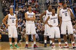HARTFORD, CT - JANUARY 9:  Jeremy Lamb #3, Andre Drummond #12, Shabazz Napier #13, Ryan Boatright #11 and Alex Oriakhi #34 of the Connecticut Huskies take a breather against the West Virginia Mountaineers in the second  half at the XL Center on January 9, 2012,  in Hartford, Connecticut.  (Photo by Jim Rogash/Getty Images)
