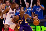 OKLAHOMA CITY - APRIL 30: Kobe Bryant #24 of the Los Angeles Lakers looks to get past Kevin Durant #35 of the Oklahoma City Thunder during Game Six of the Western Conference Quarterfinals of the 2010 NBA Playoffs on April 30, 2010 at the Ford Center in Oklahoma City, Oklahoma.  The Lakers beat the Thunder 95-94.  NOTE TO USER: User expressly acknowledges and agrees that, by downloading and or using this photograph, User is consenting to the terms and conditions of the Getty Images License Agreement.  (Photo by Dilip Vishwanat/Getty Images)