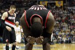 MEMPHIS, TN - APRIL 21:  J.J. Hickson #21 of the Portland Trail Blazers reacts after losing the ball out of bounds during the NBA game against the Memphis Grizzlies  at FedExForum on April 21, 2012 in Memphis, Tennessee. NOTE TO USER: User expressly acknowledges and agrees that, by downloading and or using this photograph, User is consenting to the terms and conditions of the Getty Images License Agreement.  (Photo by Andy Lyons/Getty Images)