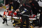 CHICAGO, IL - APRIL 17:  Marian Hossa #81 of the Chicago Blackhawks is moved off of the ice on a stretcher following a collison against the Phoenix Coyotes in Game Three of the Western Conference Quarterfinals during the 2012 NHL Stanley Cup Playoffs at the United Center on April 17, 2012 in Chicago, Illinois. The Coyotes defeated the Blackhawks 3-2 in overtime.  (Photo by Jonathan Daniel/Getty Images)