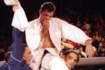 12 Nov 1993: Royce Gracie (USA), 4th-degree Jiu-Jitsu Black Belt, is lifted by members of his corner after beating Gerard Gordeau (NET) to win the Ultimate Fighting Championships in Denver, Colorado.
