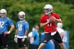 ALLEN PARK, MI - MAY 12: Kellen Moore #17of the Detroit Lions throws a pass during a rookie mini camp  at the Detroit Lions Headquarters and Training Facility on May 12, 2012 in Allen Park, Michigan. (Photo by Gregory Shamus/Getty Images)