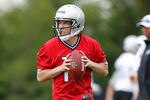 ALLEN PARK, MI - MAY 12: Kellen Moore #17of the Detroit Lions throws a pass during a rookie mini camp  at the Detroit Lions Headquarters and Training Facility on May 12, 2012 in Allen Park, Michigan. (Photo by Gregory Shamus/Getty Images)