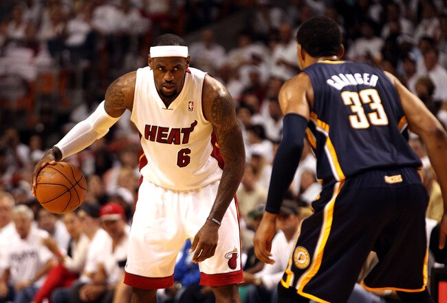 MIAMI, FL - MAY 13:  Forward Lebron James #6 of the Miami Heat drives against Forward danny Granger #33 of the Indiana Pacers in Game One of the Eastern Conference Semifinals in the 2012 NBA Playoffs on May 13, 2012 at the American Airines Arena in Miami, Florida. NOTE TO USER: User expressly acknowledges and agrees that, by downloading and or using this photograph, User is consenting to the terms and conditions of the Getty Images License Agreement.  (Photo by Marc Serota/Getty Images)