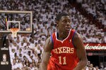 MIAMI, FL - APRIL 18:  Jrue Holiday #11 of the Philadelphia 76ers dribbles   during game two of the Eastern Conference Quarterfinals against the Miami Heat  at American Airlines Arena on April 18, 2011 in Miami, Florida. NOTE TO USER: User expressly acknowledges and agrees that, by downloading and/or using this Photograph, User is consenting to the terms and conditions of the Getty Images License Agreement.  (Photo by Mike Ehrmann/Getty Images)
