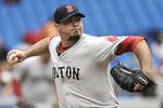 TORONTO, CANADA - SEPTEMBER 05:  Josh Beckett #19 of the Boston Red Sox delivers a pitch during MLB game action against the Toronto Blue Jays September 5, 2011 at Rogers Centre in Toronto, Ontario, Canada. (Photo by Brad White/Getty Images)