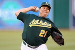 OAKLAND, CA - APRIL 23: Bartolo Colon #21 of the Oakland Athletics pitches against the Chicago White Sox at O.co Coliseum on April 23, 2012 in Oakland, California.  (Photo by Ezra Shaw/Getty Images)