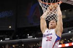 LOS ANGELES, CA - DECEMBER 01:  Blake Griffin #32 of the Los Angeles Clippers dunks against the San Antonio Spurs during a 90-85 Clipper win at the Staples Center on December 1, 2010 in Los Angeles, California.  NOTE TO USER: User expressly acknowledges and agrees that, by downloading and or using this photograph, User is consenting to the terms and conditions of the Getty Images License Agreement.  (Photo by Harry How/Getty Images)