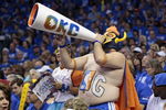 OKLAHOMA CITY, OK - APRIL 28:  An Oklahoma City Thunder fan celebrates during the game against the Dallas Mavericks in Game One of the Western Conference Quarterfinals in the 2012 NBA Playoffs on April 28, 2012 at the Chesapeake Energy Arena in Oklahoma City, Oklahoma. Oklahoma City defeated Dallas 99-98. NOTE TO USER: User expressly acknowledges and agrees that, by downloading and or using the photograph, User is consenting to the terms and conditions of the Getty Images License Agreement. (Photo by Brett Deering/Getty Images)