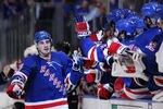 NEW YORK, NY - MAY 14:  Chris Kreider #20 of the New York Rangers celebrates his third period goal with teammates in Game One of the Eastern Conference Finals against the New Jersey Devils during the 2012 NHL Stanley Cup Playoffs at Madison Square Garden on May 14, 2012 in New York City.  (Photo by Bruce Bennett/Getty Images)