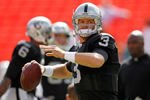 MIAMI GARDENS, FL - DECEMBER 04:  Carson Palmer #3 of the Oakland Raiders warms up  during a game against the Miami Dolphins at Sun Life Stadium on December 4, 2011 in Miami Gardens, Florida.  (Photo by Mike Ehrmann/Getty Images)