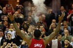 CLEVELAND - MARCH 29: LeBron James #6 of the Miami Heat performs his pre-game chalk throw ritual before the game against the Cleveland Cavaliers on March 29, 2011 at Quicken Loans Arena in Cleveland, Ohio. NOTE TO USER: User expressly acknowledges and agrees that, by downloading and/or using this Photograph, user is consenting to the terms and conditions of the Getty Images License Agreement.  (Photo by Jared Wickerham/Getty Images)
