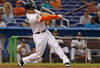 MIAMI, FL - APRIL 29: Giancarlo Stanton #27 of the Miami Marlins hits a home run in the ninth inning during a game against the Arizona Diamondbacks at Marlins Park on April 29, 2012 in Miami, Florida. The Arizona Diamondbacks defeated the Miami Marlins 8-4. (Photo by Sarah Glenn/Getty Images)