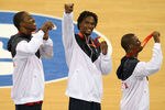 BEIJING - AUGUST 24:  (L-R)  Dwight Howard #11, Chris Bosh #12 and Chris Paul #13 of the United States stand on the podium defeating Spain in the gold medal game during Day 16 of the Beijing 2008 Olympic Games at the Beijing Olympic Basketball Gymnasium on August 24, 2008 in Beijing, China.  (Photo by Nick Laham/Getty Images)