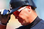 ST. LOUIS, MO - MAY 13: Chipper Jones #10 of the Atlanta Braves returns to the dugout after striking out against the St. Louis Cardinals at Busch Stadium on May 13, 2012 in St. Louis, Missouri.  (Photo by Dilip Vishwanat/Getty Images)