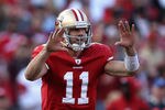 SAN FRANCISCO, CA - JANUARY 14:  Alex Smith #11 of the San Francisco 49ers signals to his team during the NFC Divisional playoff game against the New Orleans Saints at Candlestick Park on January 14, 2012 in San Francisco, California.  (Photo by Jed Jacobsohn/Getty Images)