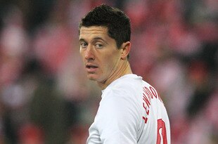 POZNAN, POLAND - NOVEMBER 15:  Robert Lewandowski of Poland in action during the International Friendly match between Poland and Hungary at the Miejski Stadium on November 15, 2011 in Poznan, Poland.  (Photo by Dean Mouhtaropoulos/Getty Images)