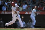 ANAHEIM, CA - MAY 15:  Albert Pujols #5 of the Angels of Anaheim hits an RBI single against the Oakland Athletics in the third inning at Angel Stadium of Anaheim on May 15, 2012 in Anaheim, California.  (Photo by Jonathan Moore/Getty Images)