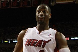 MIAMI, FL - MAY 13:  Guard Dwyane Wade #3 of the Miami Heat reacts against the Indiana Pacers in Game One of the Eastern Conference Semifinals in the 2012 NBA Playoffs on May 13, 2012 at the American Airines Arena in Miami, Florida. The Heat defeated the Pacers 95-86. NOTE TO USER: User expressly acknowledges and agrees that, by downloading and or using this photograph, User is consenting to the terms and conditions of the Getty Images License Agreement.  (Photo by Marc Serota/Getty Images)
