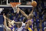 OKLAHOMA CITY, OK - MAY 14: Kobe Bryant #24 of the Los Angeles Lakers shoots over Nazr Mohammed #8 of the Oklahoma City Thunder  in Game One of the Western Conference Semifinals in the 2012 NBA Playoffs on May 14, 2012 at the Chesapeake Energy Arena in Oklahoma City, Oklahoma. Oklahoma City defeated Los Angeles 119-90. NOTE TO USER: User expressly acknowledges and agrees that, by downloading and or using the photograph, User is consenting to the terms and conditions of the Getty Images License Agreement. (Photo by Brett Deering/Getty Images)