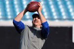 JACKSONVILLE, FL - JANUARY 01: Tight end Dallas Clark #44 of the Indianapolis Colts grabs a warmup pass against the Jacksonville Jaguars January 1, 2012 at EverBank Field in Jacksonville, Florida.  (Photo by Al Messerschmidt/Getty Images)