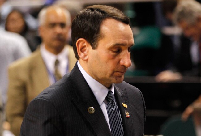 GREENSBORO, NC - MARCH 16:  Head coach Mike Krzyzewski of the Duke Blue Devils walks off the court after losing to the Lehigh Mountain Hawks 75-70 during the second round of the 2012 NCAA Men's Basketball Tournament at Greensboro Coliseum on March 16, 2012 in Greensboro, North Carolina.  (Photo by Mike Ehrmann/Getty Images)