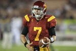 LOS ANGELES, CA - NOVEMBER 26:  Quarterback Matt Barkley #7 of the USC Trojans gets ready for the game with the UCLA Bruins at the Los Angeles Memorial Coliseum on November 26, 2011 in Los Angeles, California.  (Photo by Stephen Dunn/Getty Images)