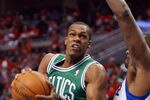 PHILADELPHIA, PA - MAY 16: Rajon Rondo #9 of the Boston Celtics drives to the basket on Elton Brand #42 of the Philadelphia 76ers in Game Three of the Eastern Conference Semifinals in the 2012 NBA Playoffs at the Wells Fargo Center on May 16, 2012 in Philadelphia, Pennsylvania. NOTE TO USER: User expressly acknowledges and agrees that, by downloading and or using this photograph, User is consenting to the terms and conditions of the Getty Images License Agreement. (Photo by Drew Hallowell/Getty Images)