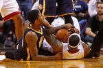 MIAMI, FL - MAY 15:  LeBron James #6 of the Miami Heat fights for a loose ball with Danny Granger #33 of the Indiana Pacers during Game Two of the Eastern Conference Semifinals in the 2012 NBA Playoffs  at AmericanAirlines Arena on May 15, 2012 in Miami, Florida. NOTE TO USER: User expressly acknowledges and agrees that, by downloading and/or using this Photograph, User is consenting to the terms and conditions of the Getty Images License Agreement.  (Photo by Mike Ehrmann/Getty Images)