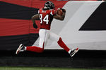 ATLANTA, GA - DECEMBER 15:  Roddy White #84 of the Atlanta Falcons scores a 29-yard touchdown reception in the third quarter against the Jacksonville Jaguars at the Georgia Dome on December 15, 2011 in Atlanta, Georgia.  (Photo by Kevin C. Cox/Getty Images)