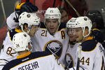 WASHINGTON, DC - MARCH 27: Drew Stafford #21 of the Buffalo Sabres celebrates his third period goal with teammates Marcus Foligno #82, Tyler Ennis #63, Robyn Regehr #24, and Andrej Sekera #44 against the Washington Capitals at the Verizon Center on March 27, 2012 in Washington, DC.  (Photo by Rob Carr/Getty Images)